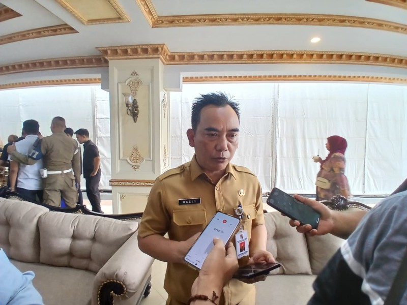 Lawan Dampak Karhutla, Dinkes Pekanbaru Turun ke Titik Keramaian Bagi Masker Gratis