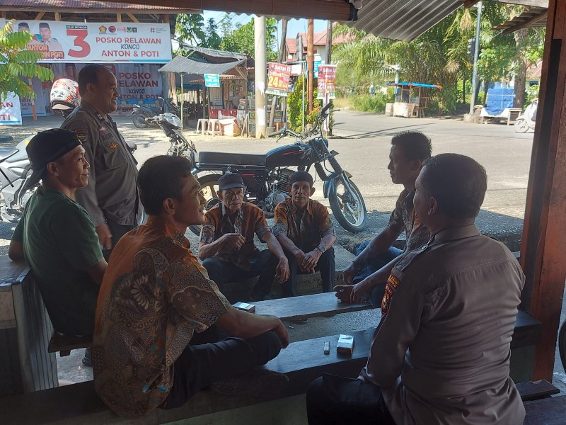 Polsek Rambah Sambangi Masyarakat Simpang IV Lembaga Desa Koto Tinggi Wujudkan Pilkada Damai