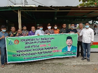 Ansor Riau Bagikan Vitamin ke Masyarakat Pekanbaru 