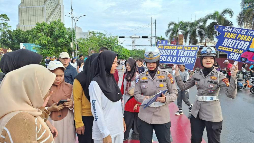 Jelang Pemilu, Ditlantas Polda Riau Ajak Pengunjung CFD Pekanbaru Sukseskan Pilkada 2024