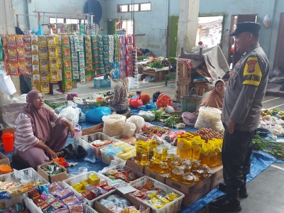 Polsek Rambah Sampaikan Pesan Pilkada Damai di Pasar Gor Desa Koto Tinggi