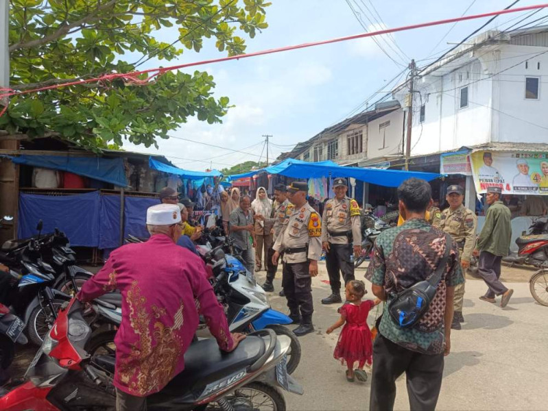 Polsek Tempuling Lakukan Patroli di Pasar Jaga Suasana Kamtibmas Pilkada 2024